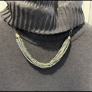 Funky silver necklace.